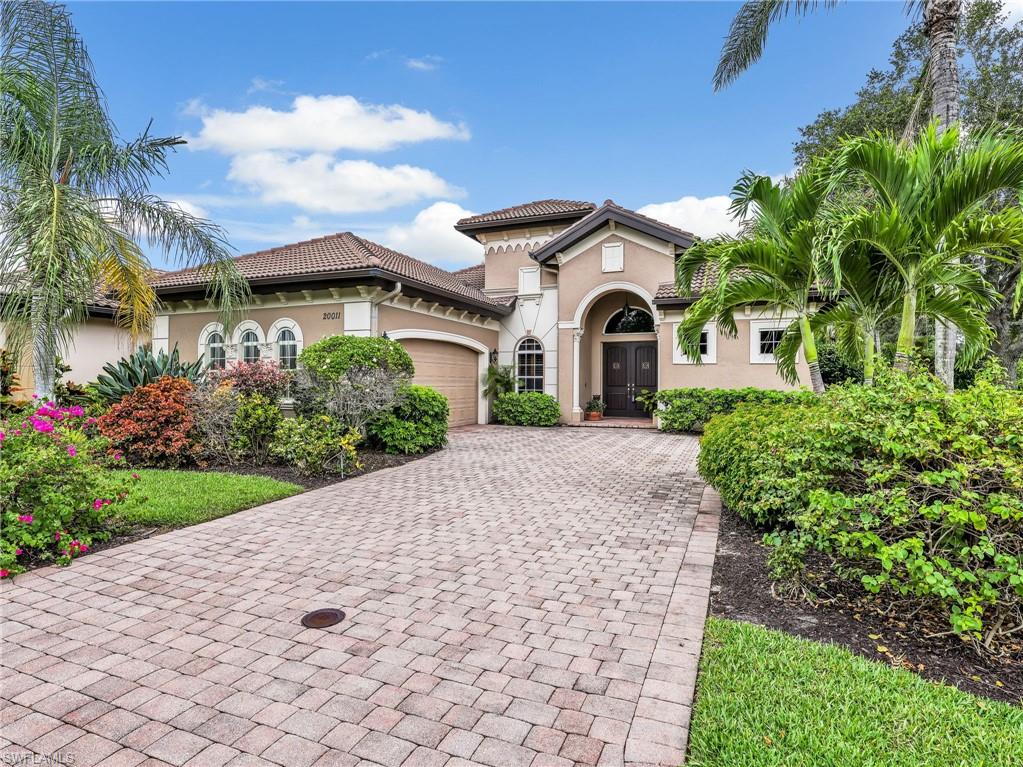 Front View with Side Entry Garage & Wide Paver Driveway