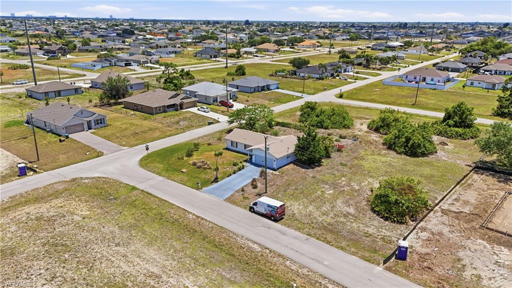 Expansive land plot featuring partial clearing and mature shrubbery