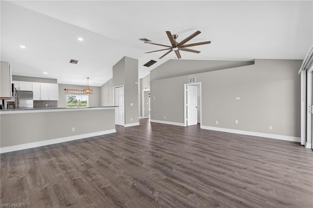 Bright Open Living & Vaulted Ceiling & Large Ceiling Fan Light