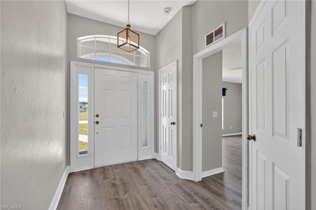 Beautiful Foyer w/Transom Window & Sidelights Door