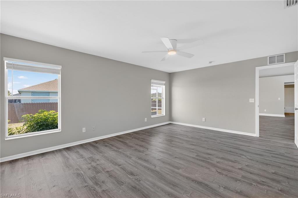 Light & Bright Primary Suite - Seamless LIFEPROOF Flooring Throughout