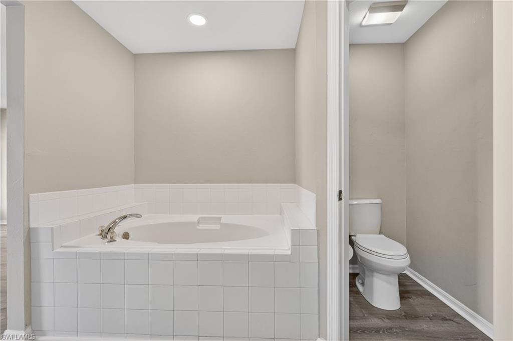 Spa-Like Tub & Private Toilet Closet - New Toilet