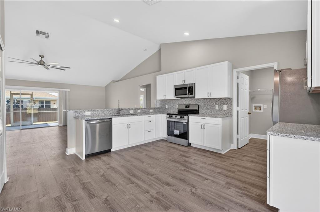 Renovated 1" Granite Countertops, New Appliances, New Flooring Throughout
