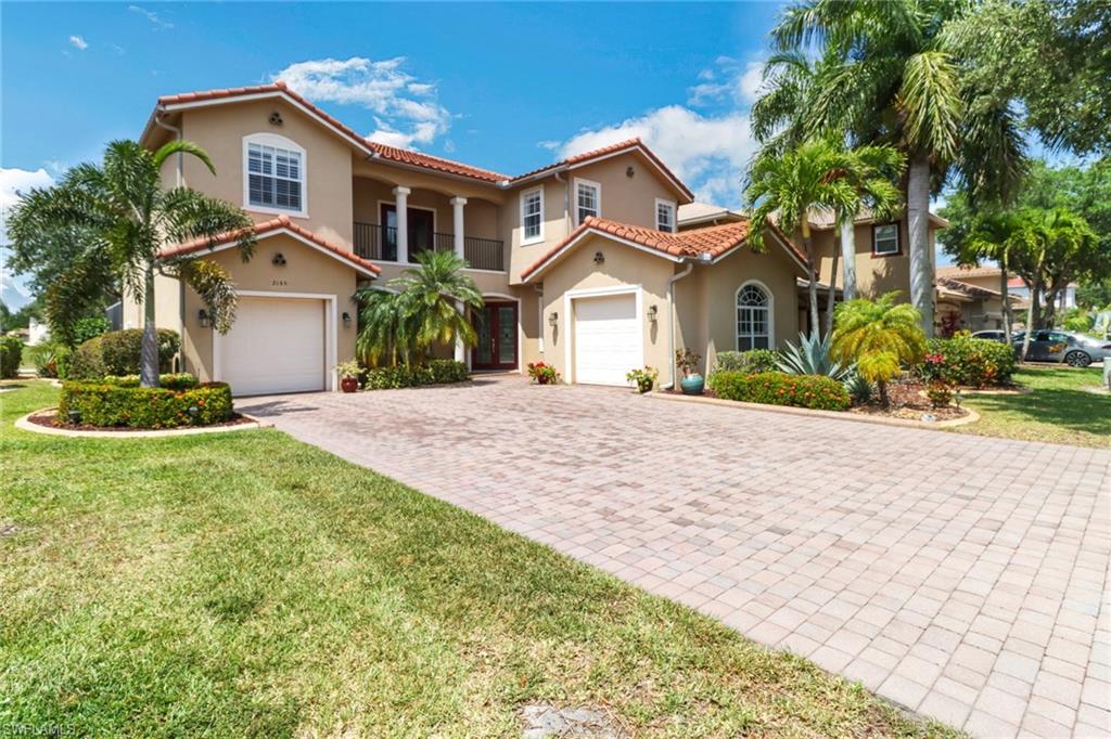Long driveway, three-car garage