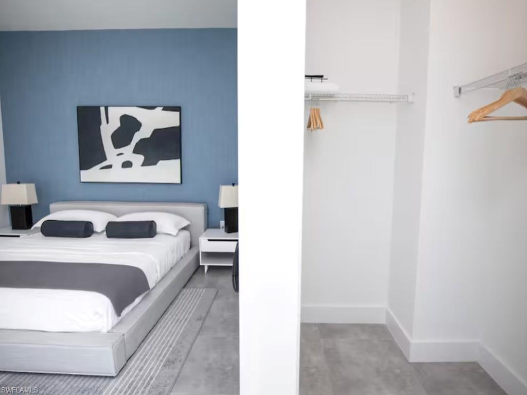 Bedroom space with a walk-in closet
