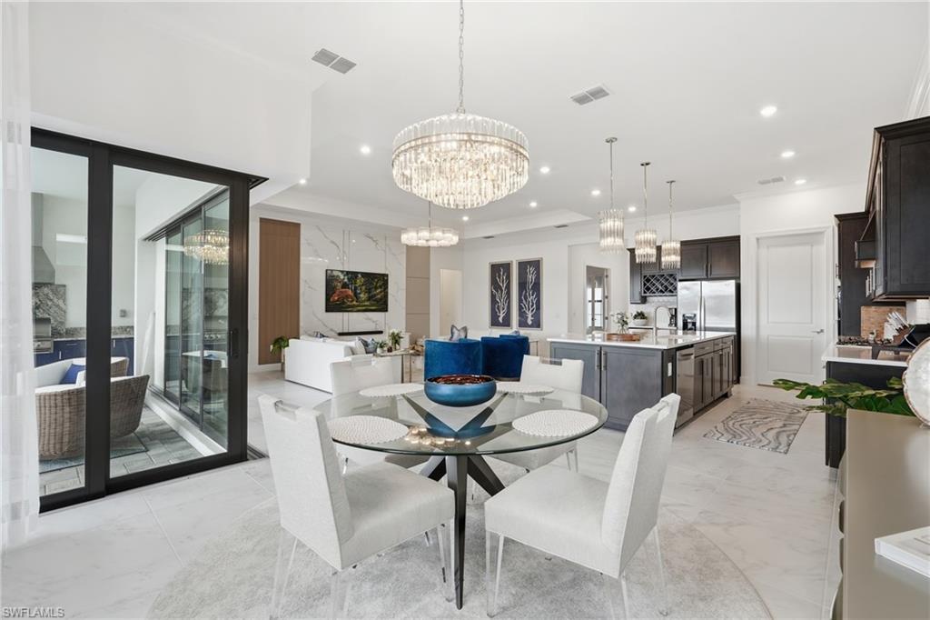 Elegant Dining Area with Pool and Outdoor Views