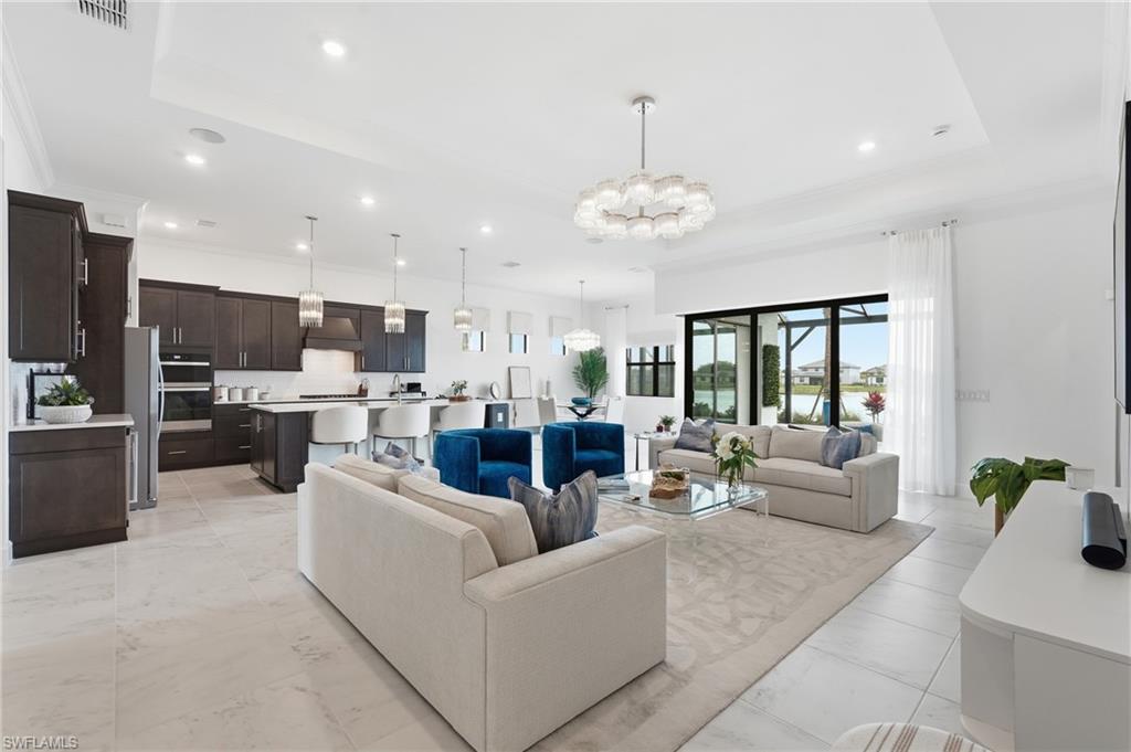 Open Floor-plan and flow into kitchen, dining and outdoor area