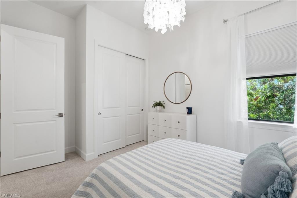 Bed 3 -Relaxing Guest Bedroom with Chandelier Lighting, Shades and Draperies