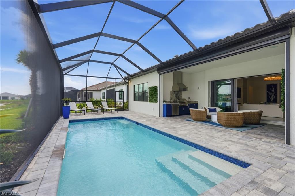 Enclosed Pool and New Outdoor Kitchen and Entertaining Area
