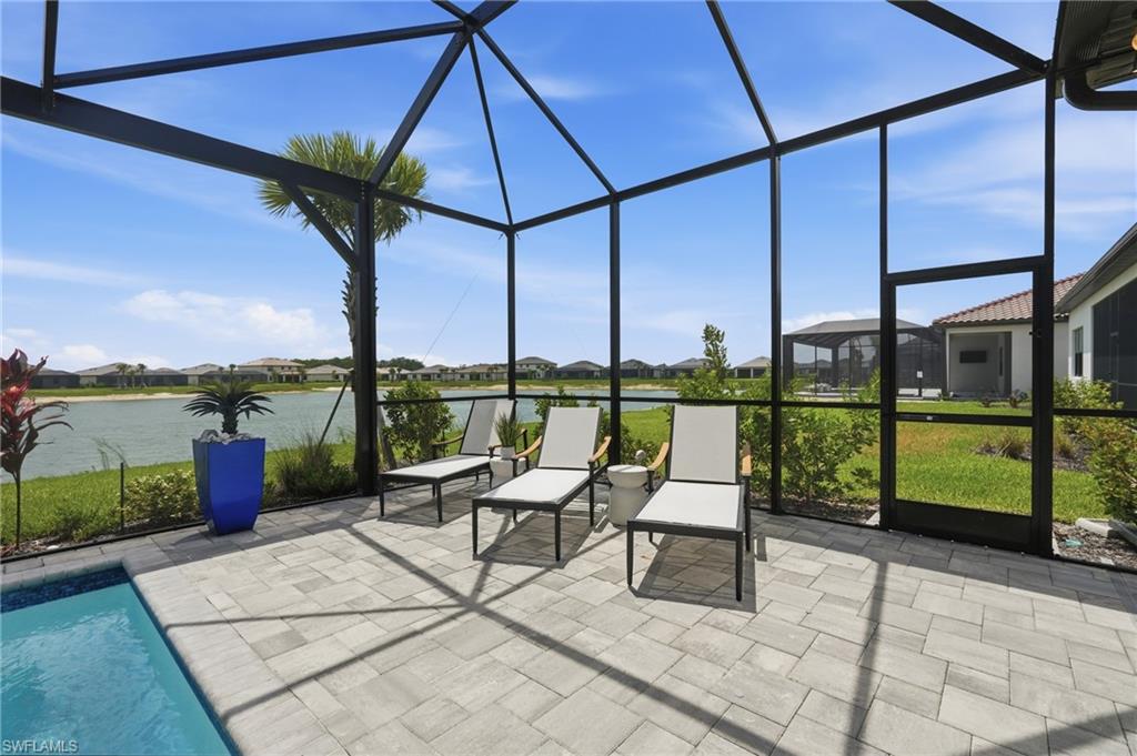 Spacious Pool deck with outdoor lounging and sun deck