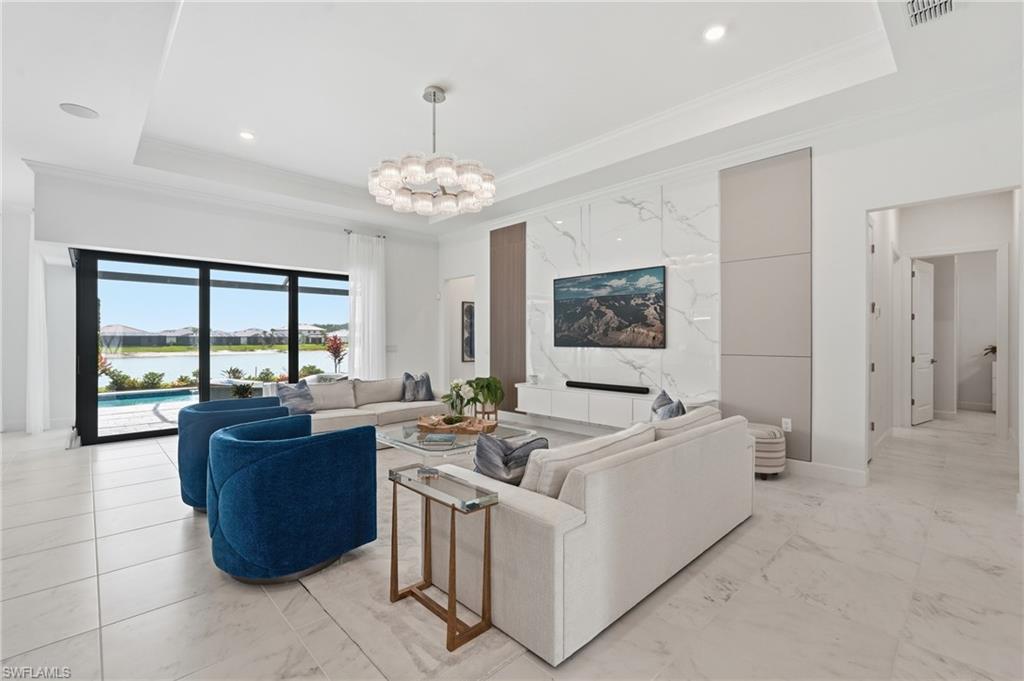 Living Room with Dropped Ceiling, Custom Tv Wall and Views to Outdoor Oasis