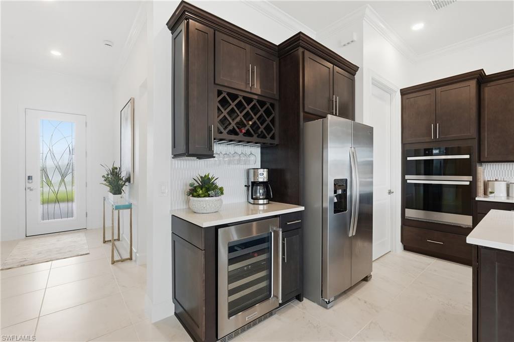 Wine and Coffee Bar with Built in Beverage Fridge and Wine Storage