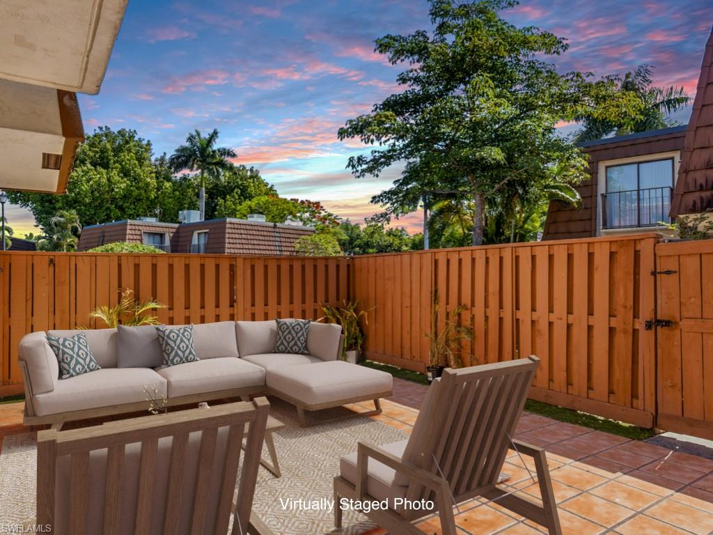 Virtually Staged vast fenced in patio
