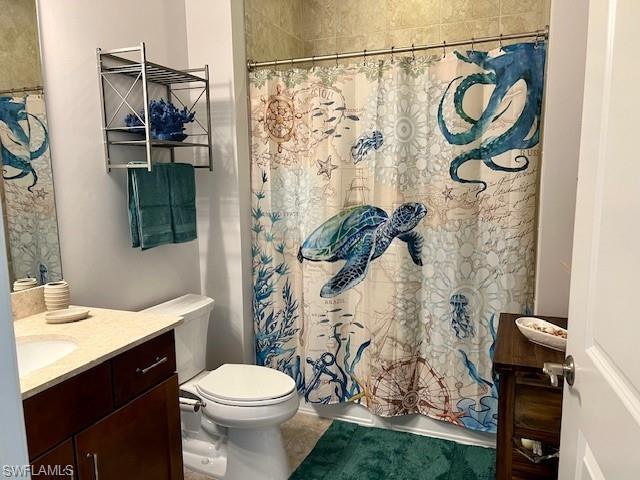Bathroom with toilet and vanity