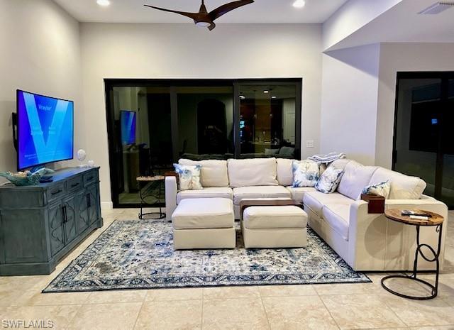 Tiled living room with ceiling fan