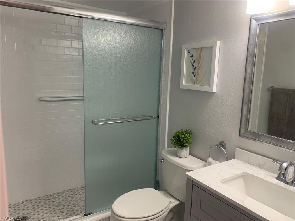 Updated Bathroom with walk-in tile shower