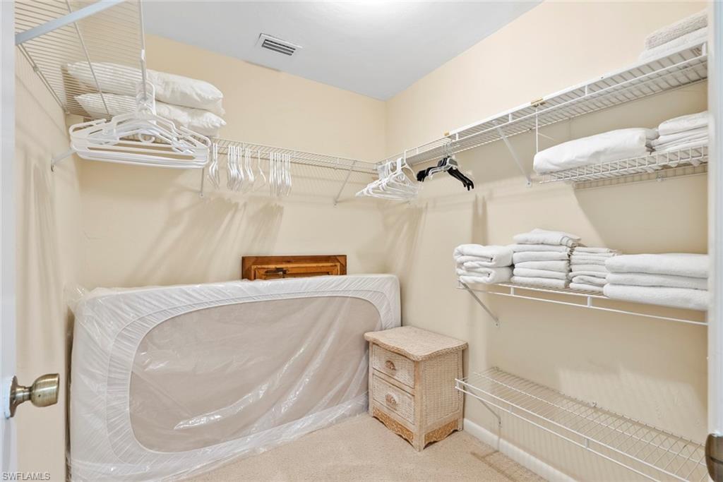 Plenty of storage options in the primary walk-in closet