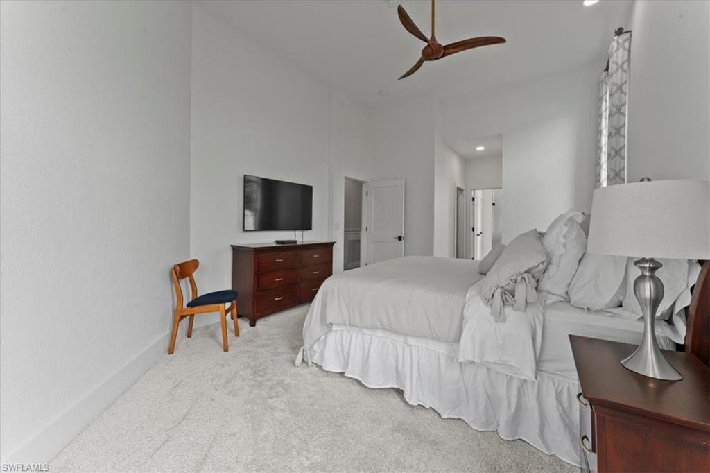 Bedroom with carpet floors and ceiling fan