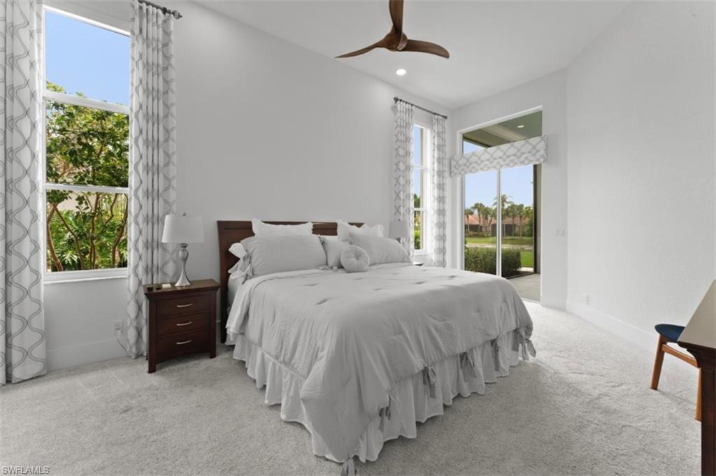 Bedroom featuring access to outside, carpet, ceiling fan, and recessed lighting