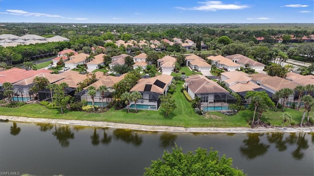 Aerial view of residential area with a nearby body of water