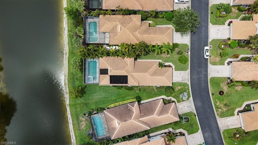 Aerial overview of property's location with a pool area