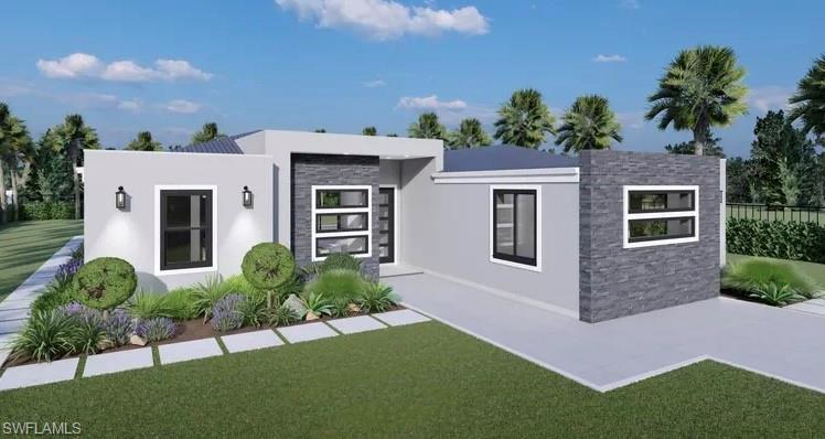 Modern exterior with a light gray stucco finish, dark stacked stone accents, and black-framed windows