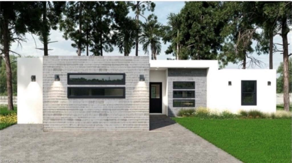 Contemporary exterior featuring a flat roofline, mixed material facade with brick and stucco, black-framed windows, a dark entry door, and integrated exterior lighting