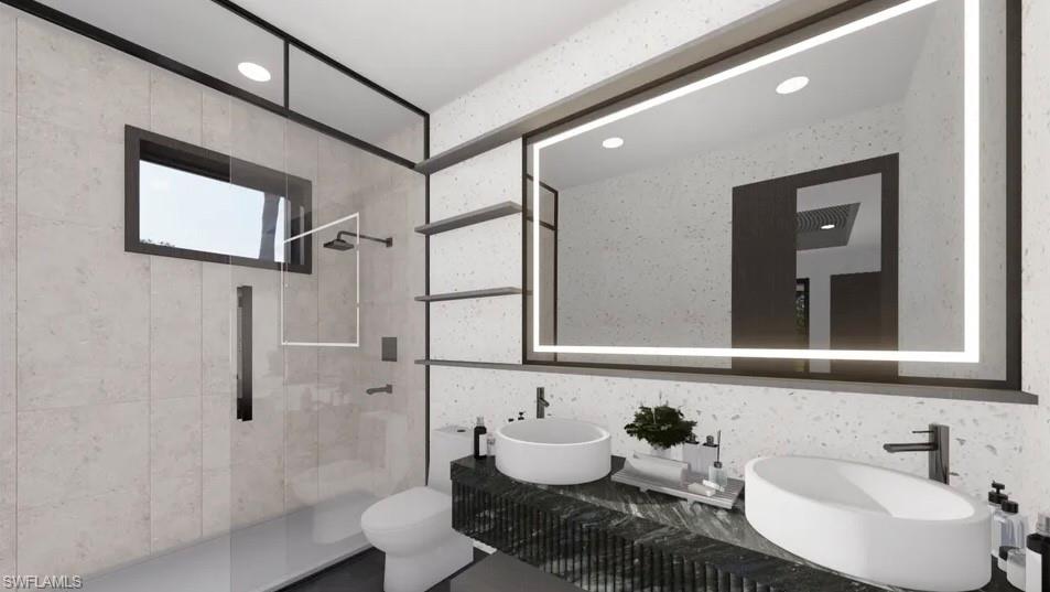 Contemporary bathroom featuring a dual vessel sink vanity with a dark textured countertop and an illuminated mirrored cabinet