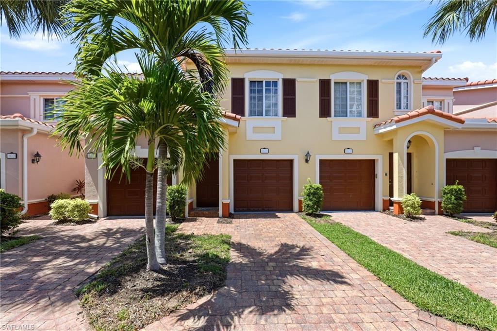 Front door in line with Palm, garage to the right - both yellow