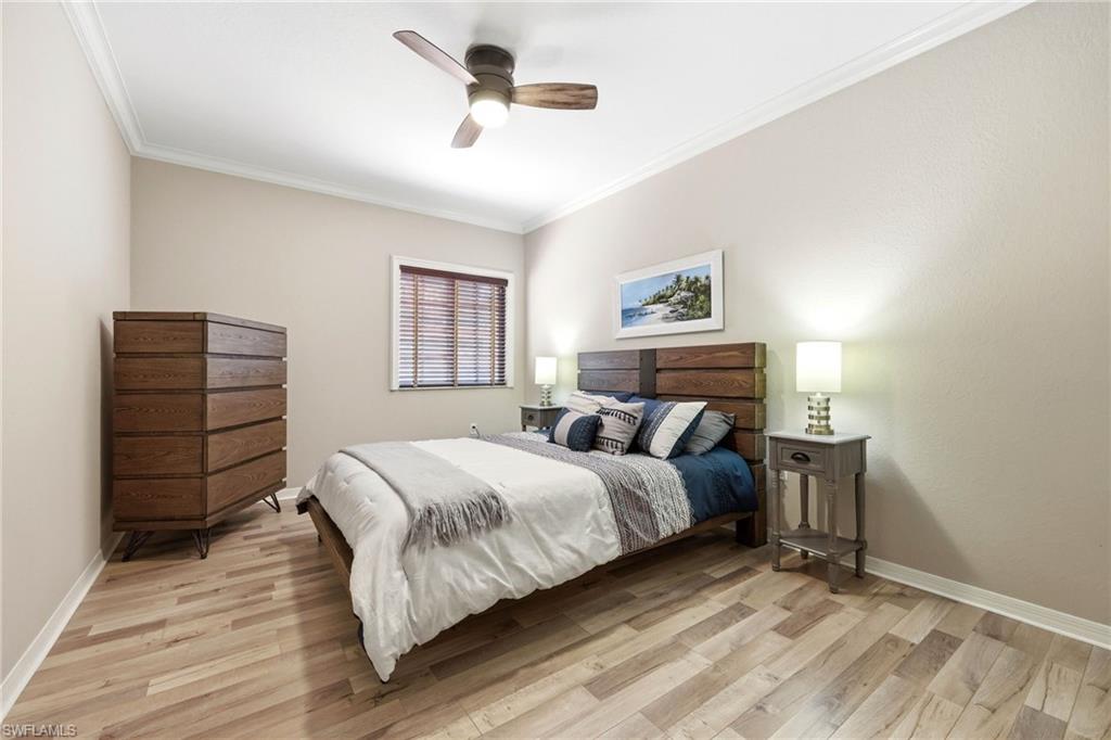 Guest bedroom with large closet, front of condo