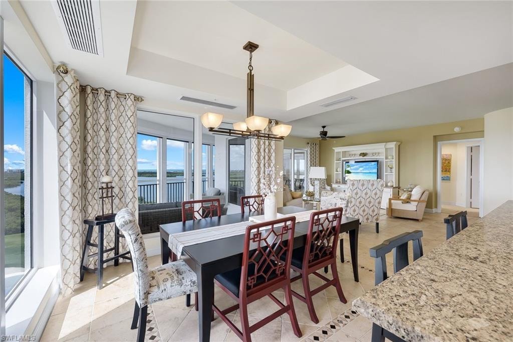 Airy dining room open to the kitchen, creating a seamless flow for entertaining.
