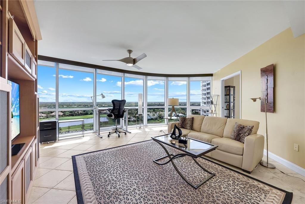 Third bedroom is currently being utilized as an office featuring floor-to-ceiling windows,  STUNNING golf course and lake views, open yet intimate spaces - this home is absolutely lovely!
