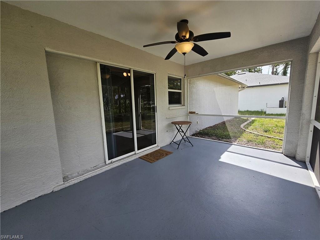 Screened patio with a painted concrete floor