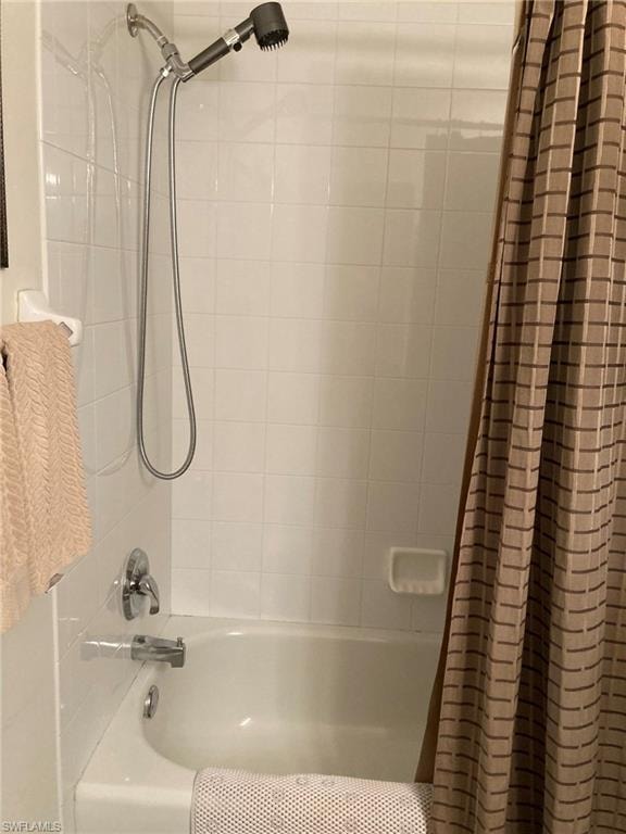 Bathroom featuring shower / bath combo