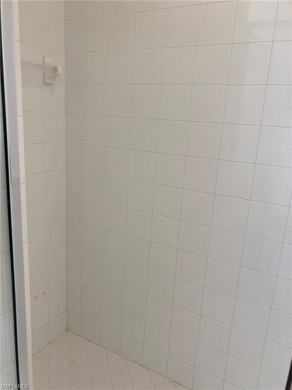 Bathroom view of a tile shower