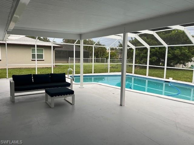Screened-in patio with a covered ceiling, providing ample outdoor living space
