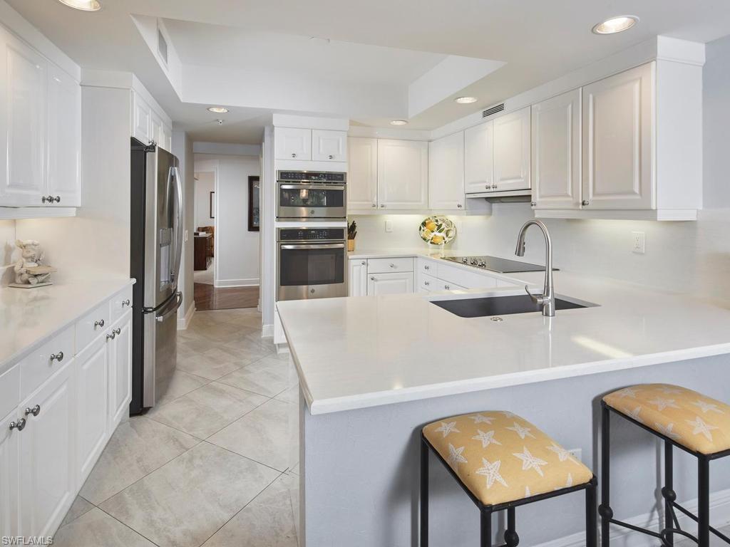 Kitchen with stainless steel appliances and new countertops