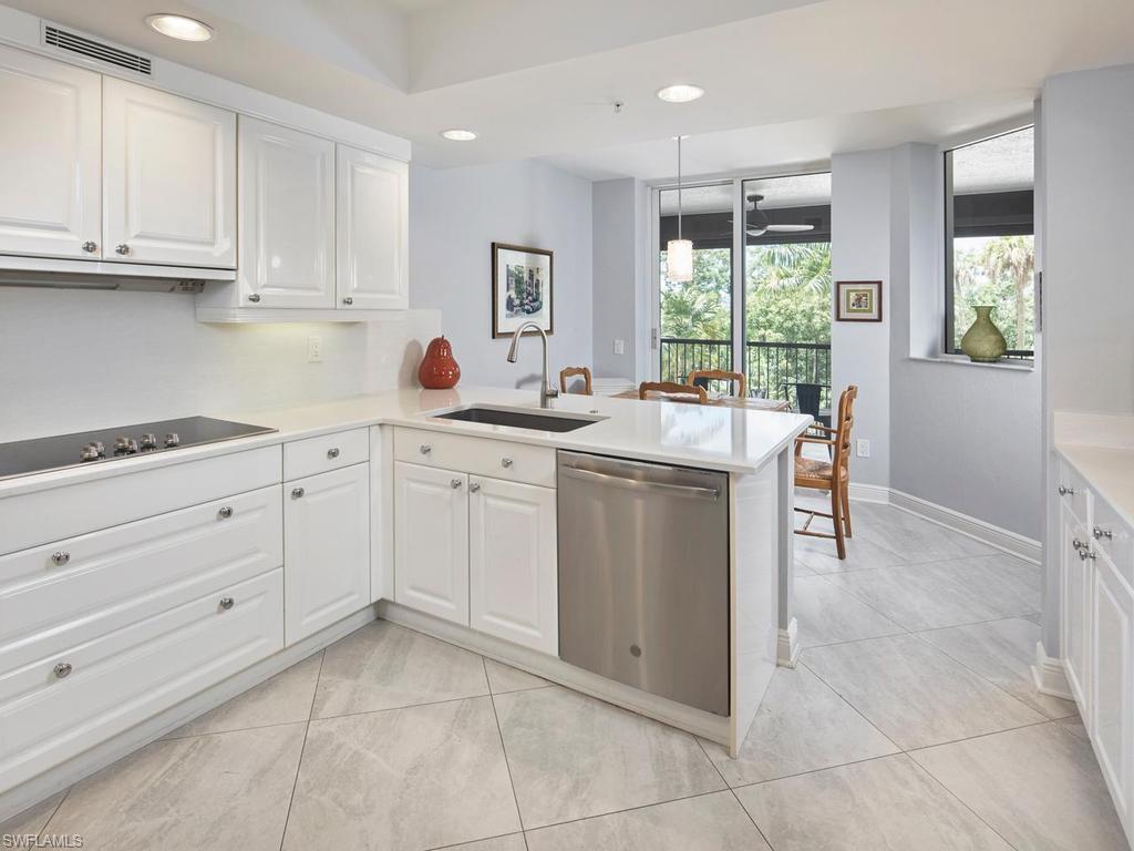 Kitchen with eat-in bar counter