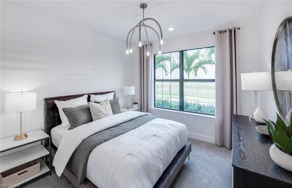 Interior photos are of a staged model home. Illustration purposes only. Options may vary. 1st floor bedrom with en suite bath.