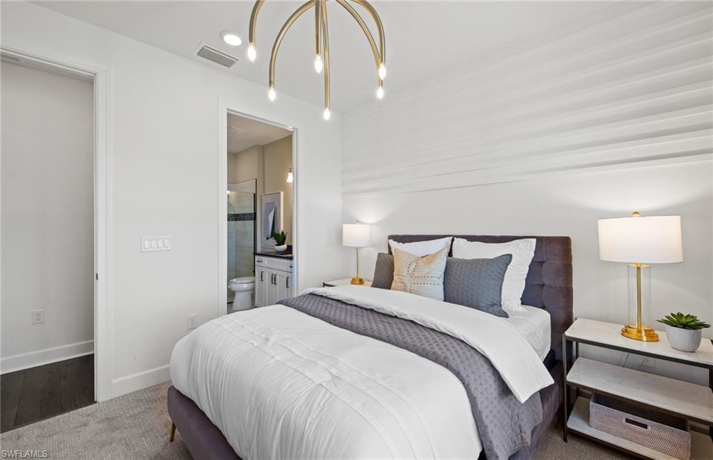 Interior photos are of a staged model home. Illustration purposes only. Options may vary. 1st floor bedroom with en suite bath.