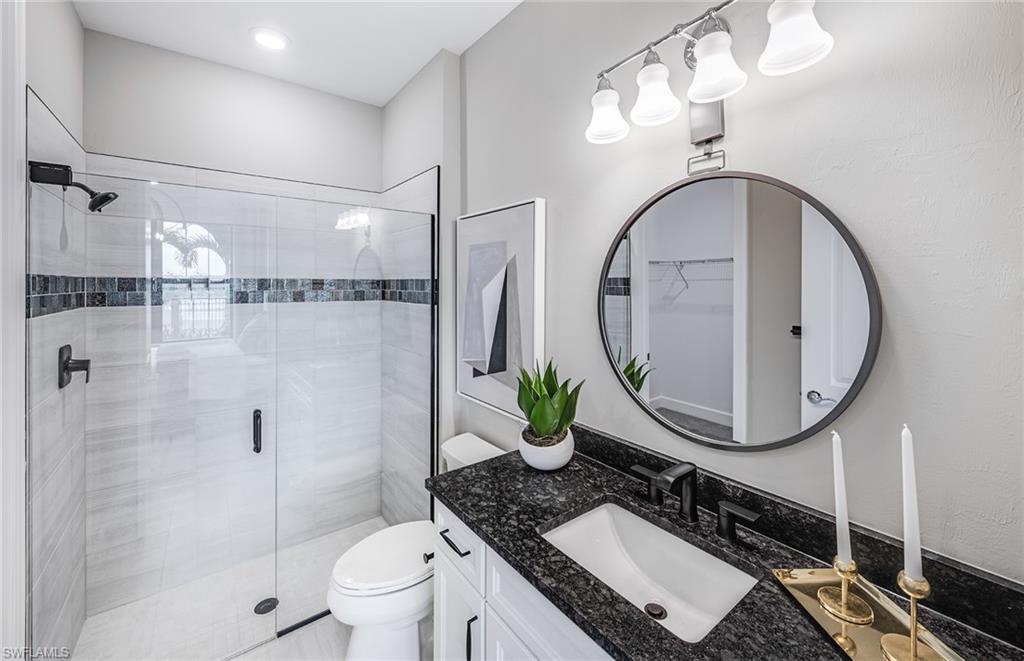 Interior photos are of a staged model home. Illustration purposes only. Options may vary. 1st floor bedrom with en suite bath.