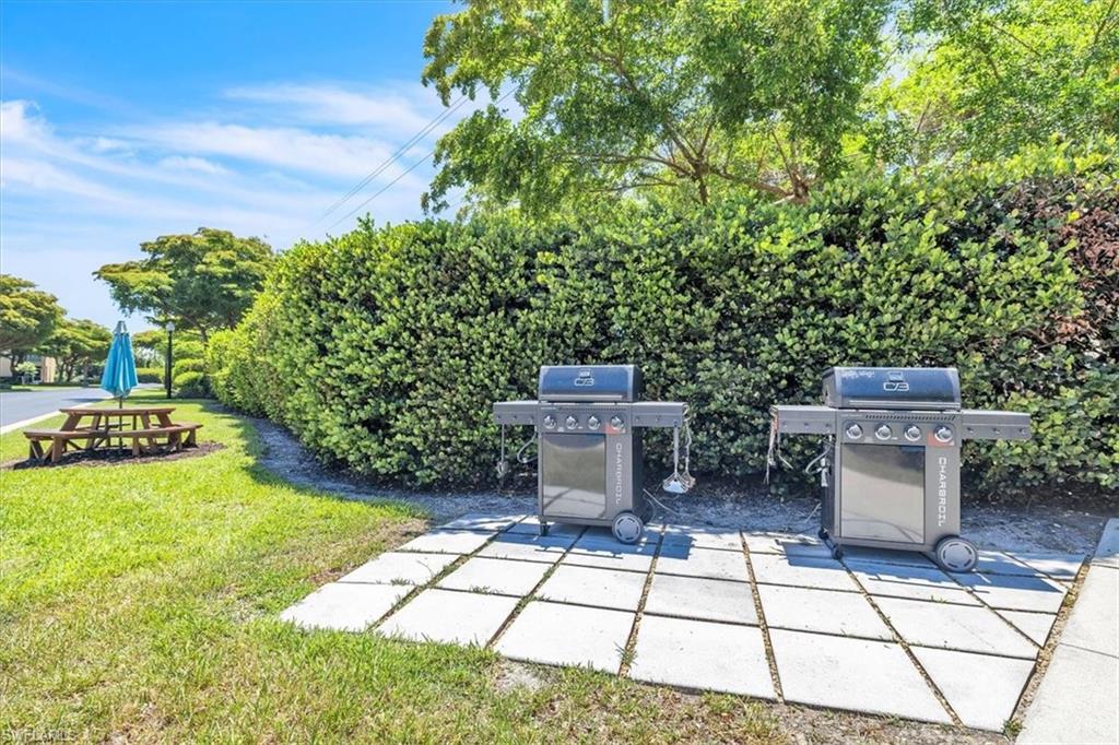 Gas Grills & seating just across drive from Pool.