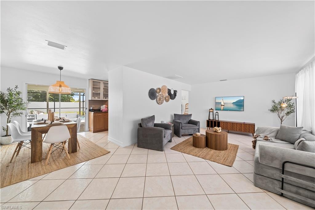 Expansive interior featuring ceramic tile flooring throughout