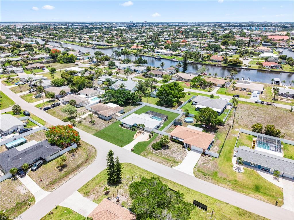 Aerial perspective highlighting a residential area with multiple properties