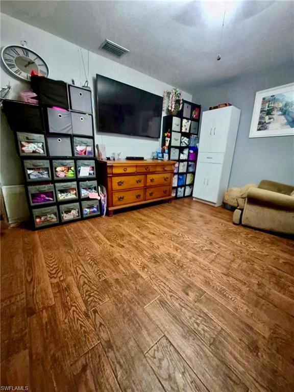 Wood-finish flooring throughout the space