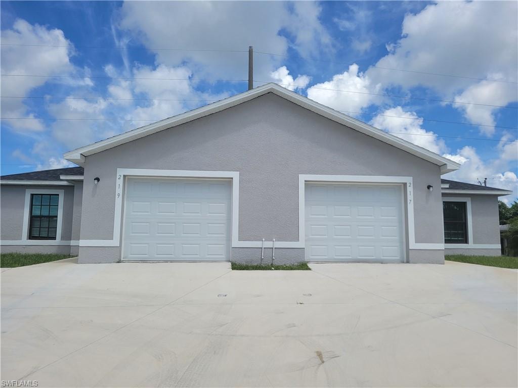 View of front facade with a garage