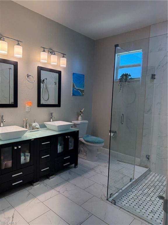 Contemporary bathroom featuring a frameless glass shower enclosure, dual vessel sinks, and a dark wood-finish vanity with ample storage