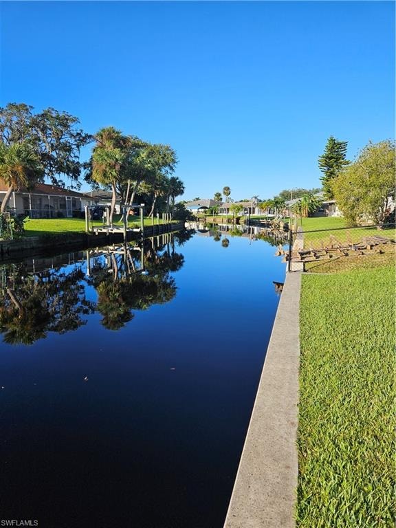 Water view featuring a boat dock