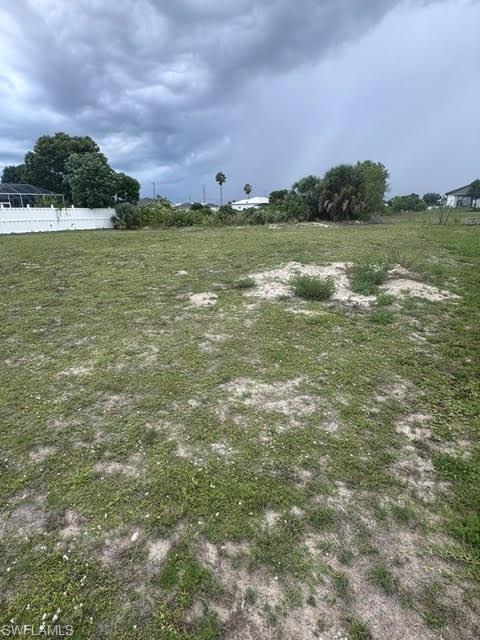 Cleared residential building lot with existing vegetation