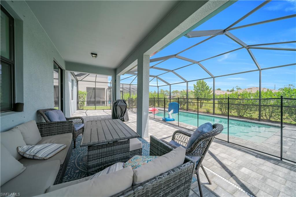 Huge covered lanai with screened pool and spa